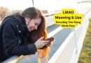 girl on bridge laughing her ass off texting lmao